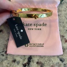 Kate Spade Gold Bracelet With Signature Spade Design Nwt Kate Spade Adjustable Gold Bracelets, Kate Spade Gold Bracelet Jewelry, Kate Spade Gold Bracelets, Adjustable Gold Kate Spade Bracelets, Trendy Kate Spade Bracelet, Chic Adjustable Kate Spade Jewelry, Kate Spade Bangle Jewelry Gift, Kate Spade Bangle Jewelry For Gift, Chic Kate Spade Bangle Bracelet