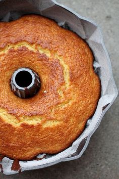 a bundt cake in a pan with a hole in the middle that has been baked