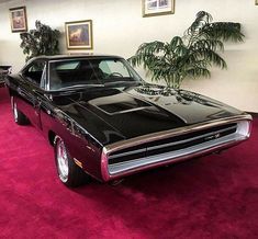 an old muscle car is on display at the dodge charger nation sequir