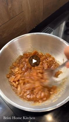 someone is mixing food in a bowl on the stove