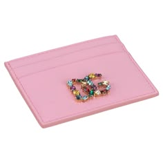 Dolce & Gabbana brand new baby pink calf leather credit card wallet with multicolor rhinestone logo . Comes with booklets, tag, authenticity card, original dustcover and original box. Luxury Pink Wallet On Chain For Formal Occasions, Leather Credit Card Wallet, Life In Pink, Pink Jewels, Diamond Heart Pendant Necklace, Collection Ideas, Credit Card Wallet, Designer Wallets, Material Girl