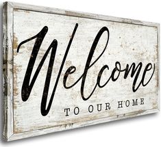 a wooden sign that says welcome to our home