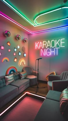 a living room filled with furniture and colorful lights on the wall above it is a karaoke night sign