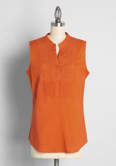 With a cottagecore flare, this burnt orange sleeveless top is sure to become a go-to in your collection. Made from a lightweight, breathable cotton fabric, this sweet top boasts a collar with half button-up closure, and delicate bib-front pintuck detailing. Perfect to pair with a flowy skirt and country-Western style boots, this breezy top is a darling addition to your spring and summer wardrobe. Cotton. Hand wash. Semi-sheer. Front button closure. Imported Fabric provides stretch. S=28 inches L Vintage Style Swimwear, Designer Plus Size Clothing, Casual Dresses Plus Size, Sweet Top, Plus Size Summer Outfits, Western Style Boots, Midi Dress Plus Size, Orange Outfit, Feminine Blouses