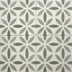 an artistic tile design in green and white