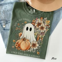 Embrace the spirit of the season with our Christian Fall T-Shirt featuring the uplifting message, "Ain't no ghost like the holy ghost." This comfy Comfort Colors t-shirt is adorned with a heartfelt graphic of a ghost beside a cross, surrounded by vibrant fall flowers. Perfect for anyone seeking faith-based apparel, this shirt makes a meaningful gift for women who cherish their Christian faith and want to share their love for Jesus in a stylish way. ♥ ♥ ♥ Thank you for stopping by ♥ ♥ ♥ 👉How to Trunk Or Treat Church, Fall Christian, Christian Fall, Social Worker Gifts, Church Shirt, Fall Clothing, Trunk Or Treat, Holy Ghost, Comfort Colors Shirt