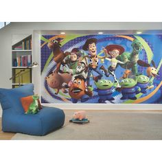 the toy story wall mural in a children's room