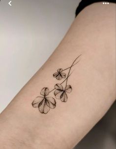 four leaf clover tattoo on the arm