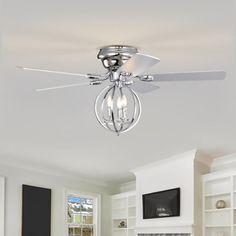 a ceiling fan with three lights in a living room