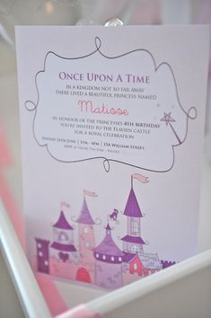 there is a card that says once upon a time in front of a box with princess castle on it