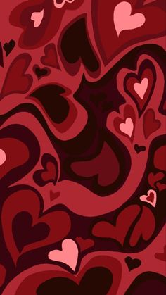 an abstract background with many hearts in red and pink colors, including one heart on the left side