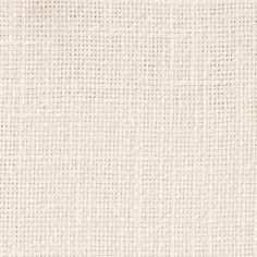 a white fabric textured with small squares