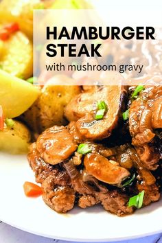 hamburger steak with mushroom gravy on a white plate