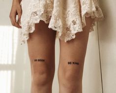 two people with tattoos on their legs that say be kind to god and do good