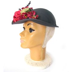 "This 1940s feminine hat has a a semi deep fitted crown with brim at the front that narrows as it wraps around the side. This is a charming round crown shell cap or bonnet, decorated with a striking arrangement of millinery flowers on the front brim. The color of the hat is a mid-value gray/green. The flower are hot pink, fuchsia and green. The spirals are wrapped in the same fabric that covers the hat. There is a white translucent cube hat pin in the back. This hat is in excellent condition. Si Classic Mini Hat With Curved Brim For Royal Ascot, Vintage Brimmed Mini Hats For Kentucky Derby, Vintage Short Brim Costume Hats For Garden Party, Classic Brimmed Mini Hat For Church, Vintage Costume Hats With Short Brim For Garden Party, Vintage Cloche Hat For Kentucky Derby With Short Brim, Vintage Cloche Hat For Kentucky Derby, Brimmed Cloche Hat For Kentucky Derby, Adjustable Vintage Hats For Races