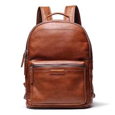 Presenting our most popular leather backpack – a robust yet luxurious accessory. Hand-crafted from vegetable-tanned leather, this backpack features a dedicated 15.6-inch laptop compartment. The refined look is versatile enough to exude sophistication in work, school, or outdoor settings. Enjoy the perfect blend of toughness and elegance with this highly sought-after leather backpack. Plenty of organizational pockets including 15.6 inches laptop compartment. Exterior: 1 front panel zipper pocket, 1 back panel hidden zipper pocket. Interior; 1 × 15.6 inches laptop sleeve, 2 small slot pockets, and 1 small zipper pocket. Dimensions + Materials- Dimensions: width: 12.6"(32cm); depth: 5.5"(14cm); height: 16.5"(42cm). Size: Medium Size. Vegetable tanned leather. Lining: polyester. Adjustable car Classic Leather Backpack With Smooth Grain For Travel, Classic Brown Soft Leather Backpack, Classic Backpack With Leather Lining, Classic Brown Laptop Backpack, Classic Leather Backpack For Business, Classic Standard Backpack With Smooth Grain, Classic Leather Business Backpack, Classic Business Backpack, Brown Travel Backpack With Smooth Grain