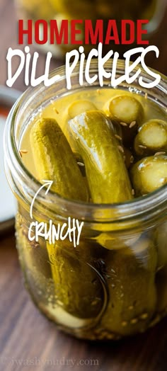 pickles in a jar with the words homemade dill pickles crunchy on top