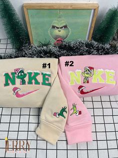 Embrace the holiday spirit with our adorable Cute Grinch Christmas Nike Embroidered Sweatshirt, the perfect Xmas gift for couples! Made with premium quality fabric, this sweatshirt offers exceptional comfort and warmth during the chilly winter days. The cute Grinch embroidery adds a festive touch, spreading joy and cheer wherever you go. With its trendy design and vibrant colors, this sweatshirt is sure to make you stand out at any holiday gathering. The Nike brand guarantees durability and styl Christmas Nike, Nike Embroidered Sweatshirt, Cute Grinch, Redo Clothes, Summer List, Preppy Gifts, Couple Ideas, Cute Nike Outfits, Halloween 3