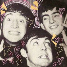 three young men are posing for the camera with hearts and arrows all over their heads