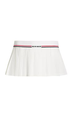 After Miu Miu's much-talked about Spring '22 collection that disrupted office dress codes, this season Miuccia set her sights on the tennis court with a collection that's Y2K-meets-preppy—and still sates our desire to show off ample skin.This ultra-mini skirt has a classic A-line cut tailored from pleated sable with a ribbed waistband designed to hang low on the hips. Complete the look with the [coordinating polo](https://www.modaoperandi.com/women/p/miu-miu/silk-cotton-polo-sweater/544638) from Designer Mini Skirt, Miu Miu Fashion, Miumiu Skirt, Designer Skirts, Skirts Mini, Cute Mini Skirt, Designer Skirt, Miu Miu Skirt, Miu Miu Tennis Skirt