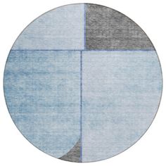 a round rug with two different colors on the top and one in grey, blue and gray