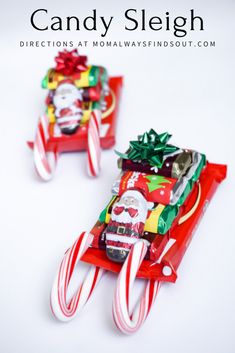 candy sleighs with santa clause on them sitting in front of a white background