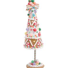 a christmas tree made out of cookies and candies on a white background with a candy cane in the shape of a cone