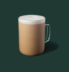 a coffee mug with a lid on a green background, it appears to be empty