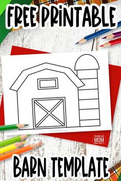 free printable barn template with colored pencils and crayons on the table