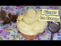 a bowl filled with ice cream sitting on top of a table