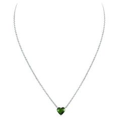 Alluring 1.02 carat heart-shaped green garnet set in white gold Heart Green Necklace, Heart-shaped Green Emerald Necklace As Gift, Green Heart-shaped Emerald Necklace For Gift, Green Heart-shaped Fine Jewelry Necklace, Green Emerald Heart-shaped Necklace, Garnet Heart Necklace, Garnet Heart, Green Garnet, Heart Necklace