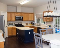 the kitchen is clean and ready to be used for cooking or dining room furniture,