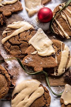 some cookies with icing and cinnamon on top