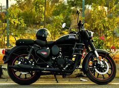 a black motorcycle is parked on the street