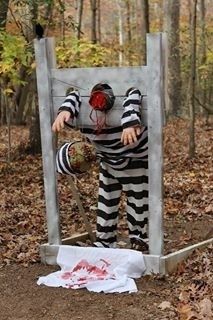 a man dressed as a jail inmate in the woods