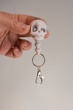 Flexible Keychain / Charm of a cute skelly skull. great item for showing off your gothic alliance 💀 Each item I list is the item you will receive as they are already printed and ready to ship. I strive to represent the color and size as accurately as possible, but please be aware different monitors and screens may display colors slightly different. I am authorized to print and sell this design by Flexi Factory. This item is NOT suitable for or geared towards children as it contains small parts Gothic Backpacks, Flexi Factory, Halloween Unique, Skull Keychain, Sculpture Art Clay, Keychain Charm, Skeleton Halloween, Zipper Charms, Art Clay