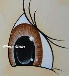 an eye painted on the wall with black and white circles around it's iris