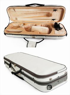 an open suitcase sitting on top of a white floor next to another case filled with items