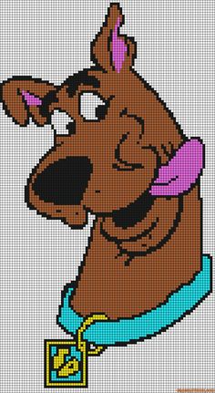 a cross stitch pattern of a dog with a frisbee in it's mouth