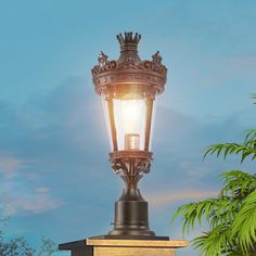 an old fashioned street light on top of a pillar