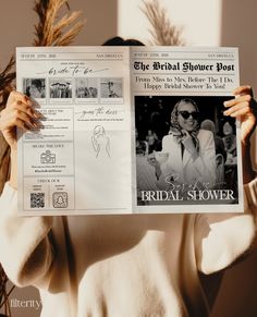 a woman holding up a newspaper with an advertisement for bridal shower on it