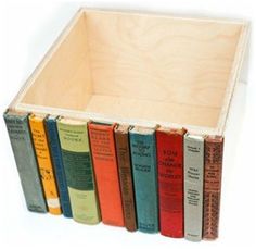 a wooden box filled with lots of books