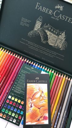 the faber - castel colored pencils are in their box