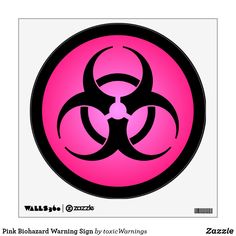 a pink and black biohazard sticker on a white background