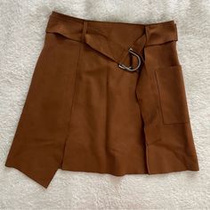 J.O.A. Faux Suede Skirt From Nordstrom. Nwot. Size Small In Camel. Will Fit Size 4-6. Forms With Loop Belt. Asymmetrical Hemline. Brown Suede. Casual Fall Skirt With Belt Loops, Fall Denim Skirt With Belt Loops, High Waist Relaxed Mini Skirt For Fall, Trendy Belted Workwear Skirt, Belted High-waist Mini Skirt For Fall, Trendy Workwear Skirt With Belt, High Waist Belted Mini Skirt For Fall, Trendy Belted Skirt For Work, Belted Mini Skirt For Fall