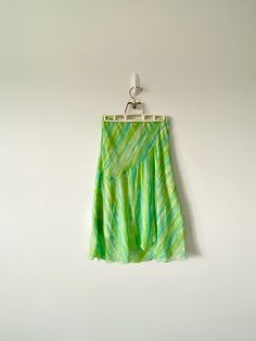 vintage sheer y2k skirt by brand wrapper in great pre-owned condition  y2k 2000 style skirt that hits below the knee bright green and blue  made in usa, marked size medium 13" wide flatlay waistline that stretches all the way to 18" wide mesh midi y2k maxi skirt  00's vintage sheer skirt by wrapper | vintage 2000 fashion skirt | sheer striped green and blue long length knee skirt | y2k skirt Green And Blue Outfit, Asymmetric Fashion, 2000 Style, Date Fits, Little Mermaid Costume, Skirt Aesthetic, Knee Skirt, 2000 Fashion, Y2k Skirt