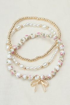 Painted Beads and Bow Bracelet Set in Pink | Altar'd State Cute Necklaces And Bracelets, Bow Jewlery, Pink And White Jewelry, Bracelets And Necklaces, Cute Pink Bracelets, Accessories Cute, Cute Jewelry Aesthetic, Pink And Gold Jewelry, Cute Jewlery