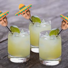 three glasses with limeade and two straw hats on them