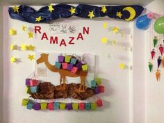 a decorated wall with some decorations on it and a camel in the middle surrounded by stars