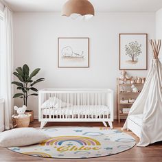 a baby's room with a white crib and toys